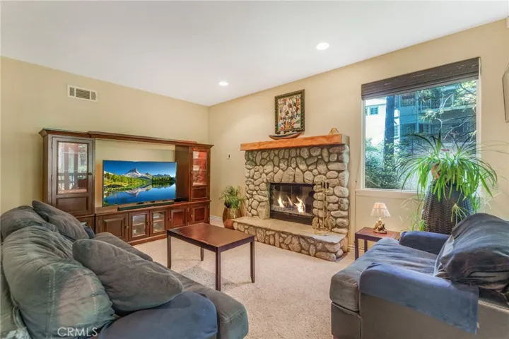 Bottom second floor Family room with fireplace.
