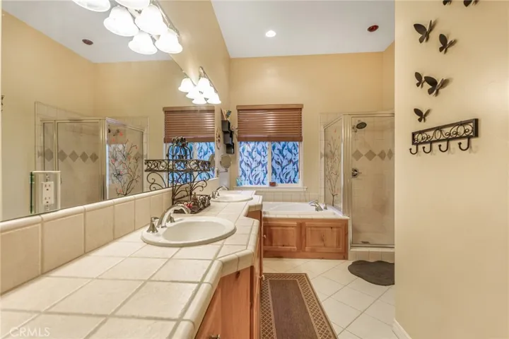Primary Suite Bathroom with Double Sink Vanity.