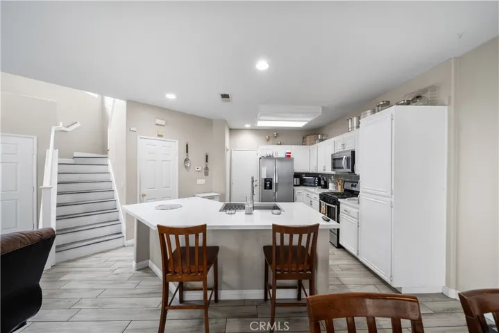 Kitchen with view of stairs
