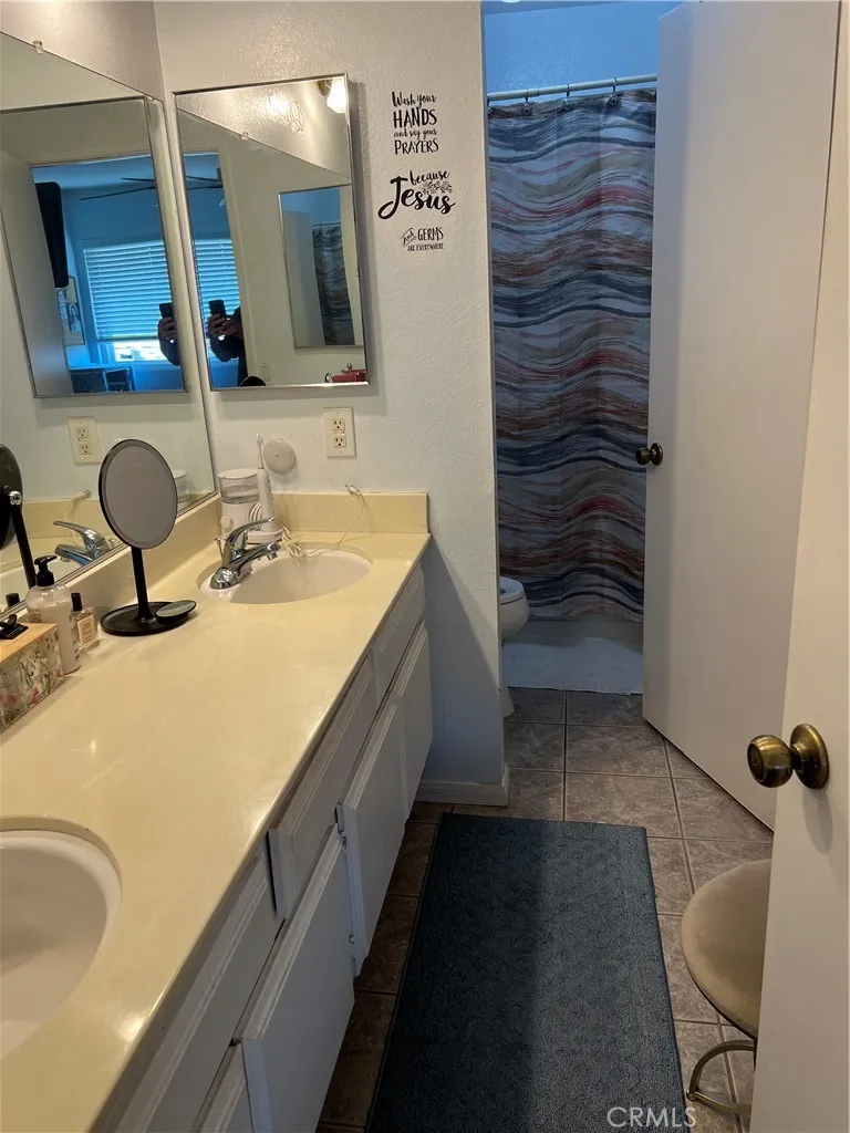 Main bathroom upstairs connecting both bedrooms