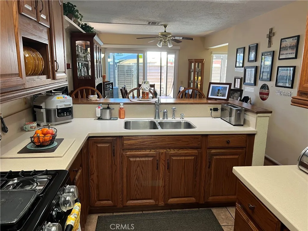 Beautiful kitchen w/view of dinning room & patio/pool escape