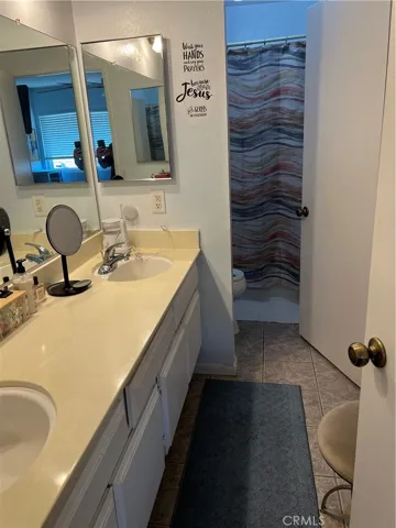 Main bathroom upstairs connecting both bedrooms