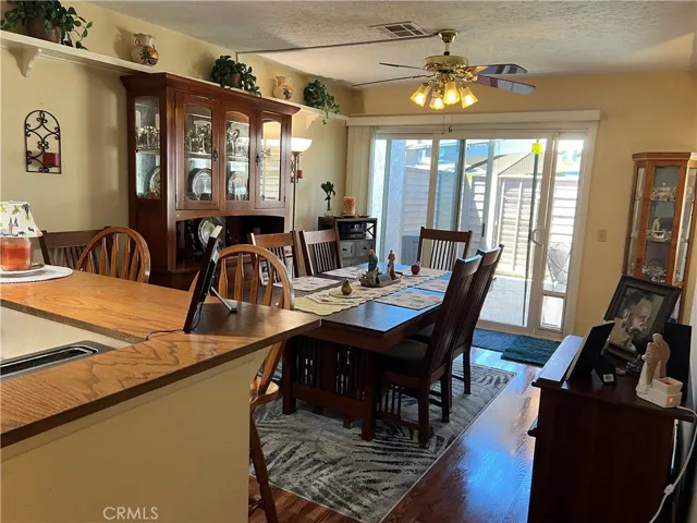 Dining room w/sliding dual pane door leading to patio