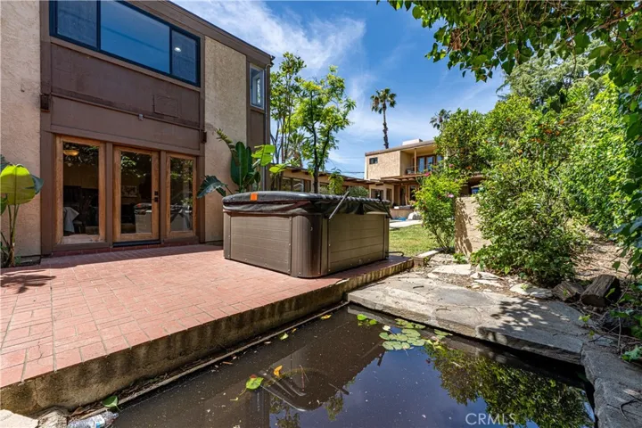 Backyard off Bonus Room & Above Ground Spa