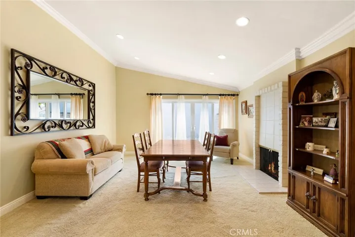 Formal living and dining rooms have a separate exit out to the side yard!