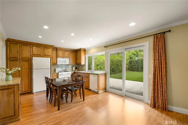Upgraded kitchen leading out to the backyard.