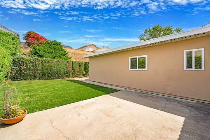The fabulous backyard offers space to play now and develop the upslope later if you wish.