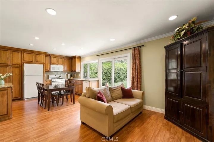 The family room opens to the kitchen and out to the backyard.