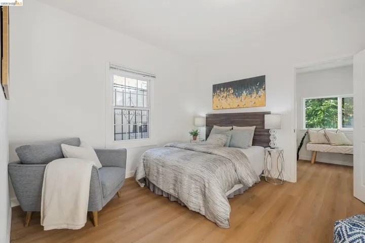 Bright interior featuring light wood-finish flooring and white walls
