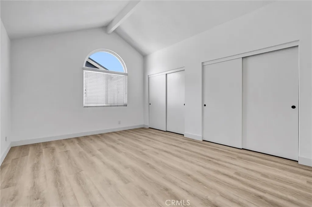 2nd Main Bedroom with its own set of wall to wall closet space - Vaulted Ceiling as well