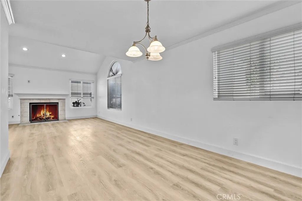 Dining Room area with extended view into the Living Room - Great for large table needs for Family and Friends Gatherings