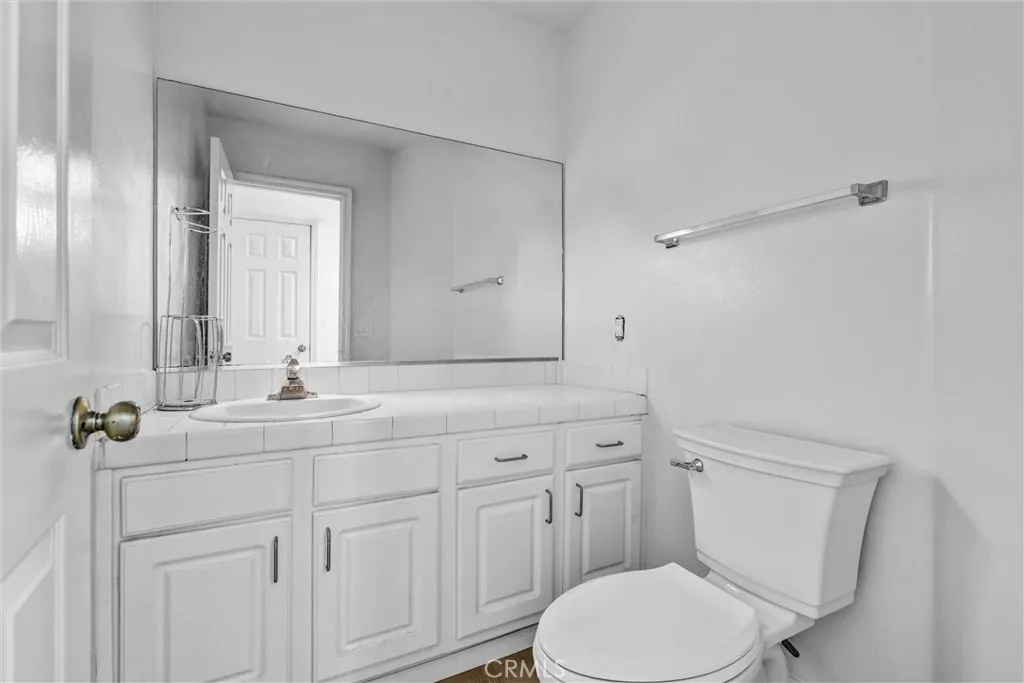 Downstairs 1/2 Bath - great convenience just off of front entry