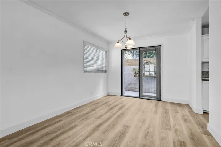 Tighter View of Dining room area - Double doors have removeable screen border for lots of fresh air cross ventilation