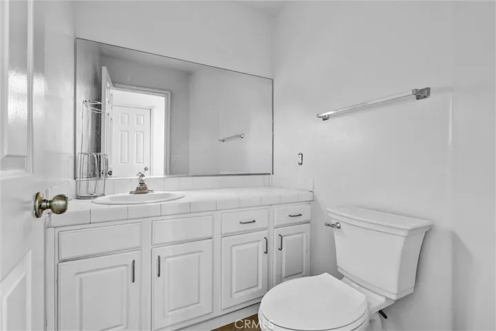 Downstairs 1/2 Bath - great convenience just off of front entry