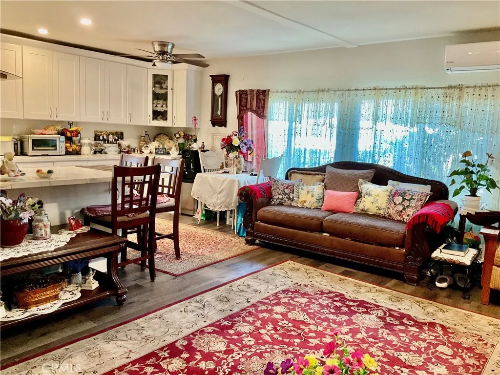 Open layout living room kitchen combo