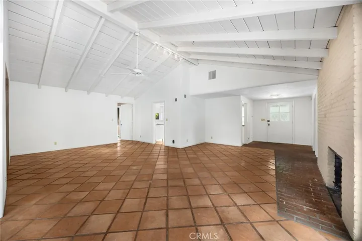 Open Concept Dining Area and Living Room with Fireplace