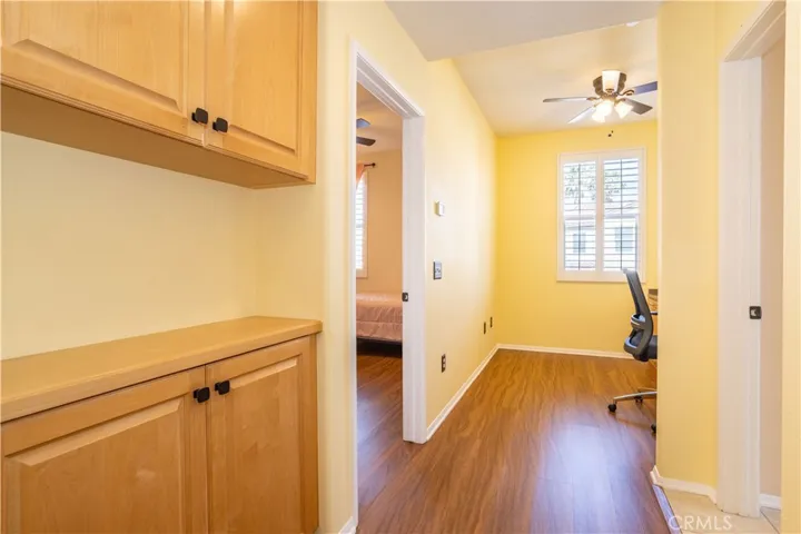 Second Level Landing with Access to Both Bedrooms and Loft. (Primary bedroom to the right)