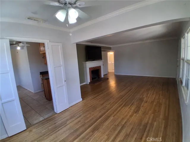 Another view showcasing the open living room and dining area.