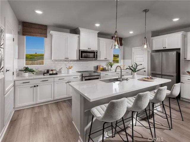 Photo is not of the actual home, but is an inspirational photo of builder’s model home and may depict options, furnishings, and/or decorator features that are not included