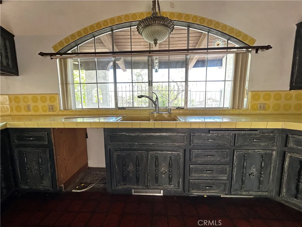 Kitchen with window facing street