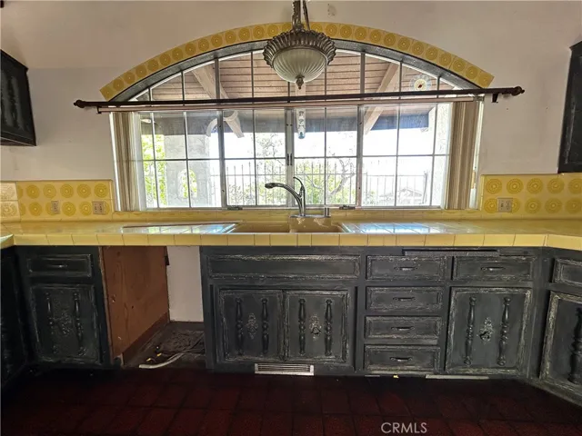 Kitchen with window facing street
