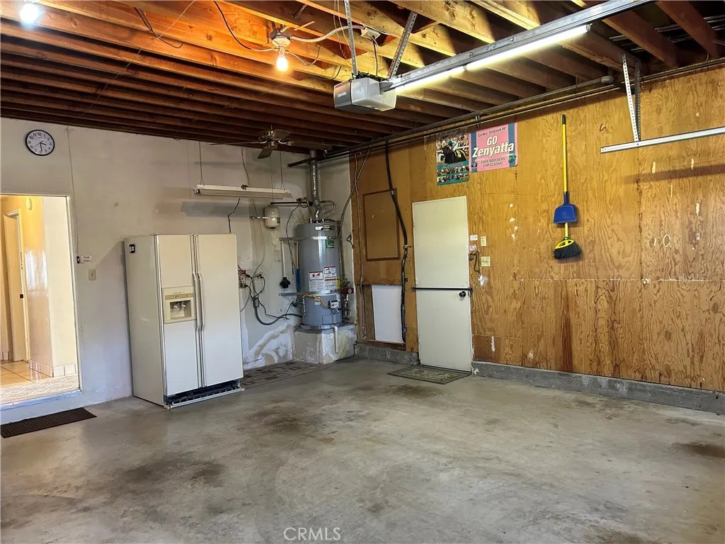 Garage with extra frig.