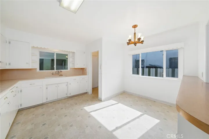 Oversized kitchen with plenty of natural light