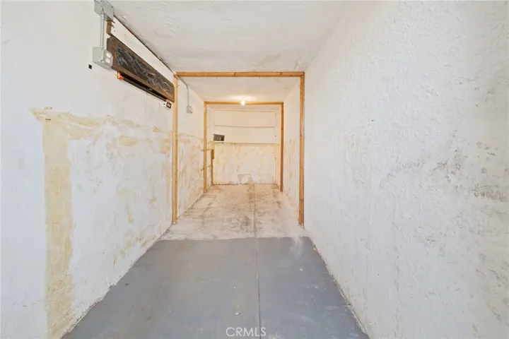 Additional storage or creative space behind the garage