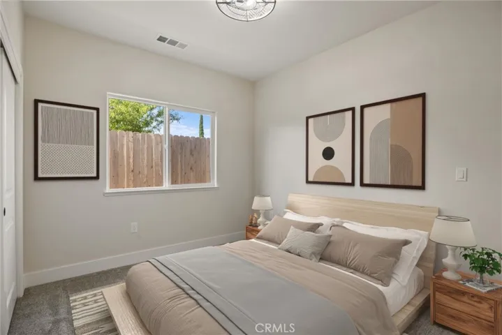 Bedroom #2. Furniture virtual staged to show possible placement.