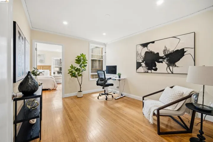 Versatile room featuring wood-finish flooring, recessed lighting, and neutral wall tones