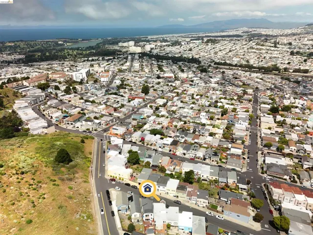Aerial perspective showcasing a residential neighborhood with dense housing