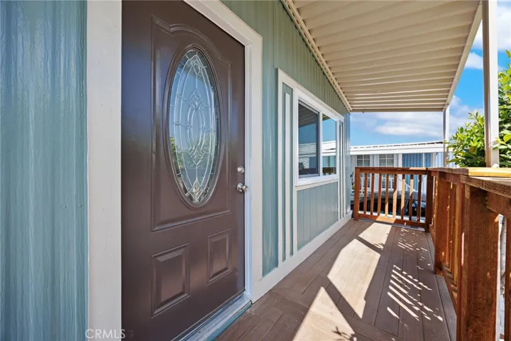 Entrance with deck in front
