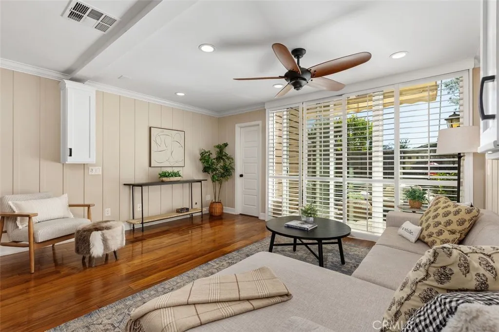 Living Room – Open living area with warm flooring, neutral paint, and a functional layout for everyday living or entertaining.

