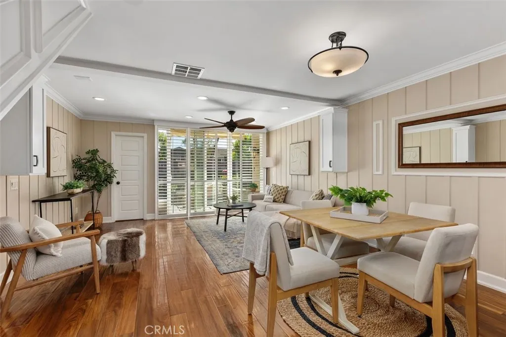 Dining Area – Light-filled dining space with hardwood flooring, neutral finishes, and easy flow to the kitchen and living areas.
