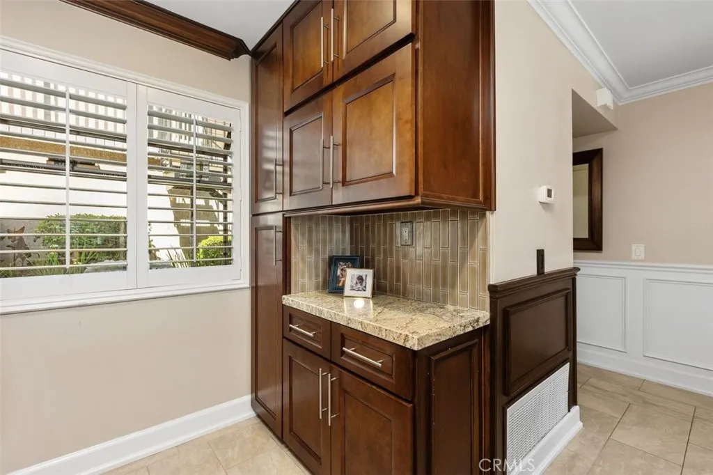 Kitchen Detail – Built-in cabinetry with floor to ceiling pantry and countertop space perfect for a coffee bar or recipe book