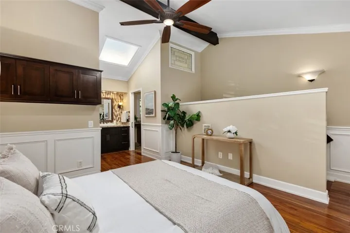 Bedroom – Bright bedroom with vaulted ceilings, neutral paint, and easy access to the adjoining office or den.
