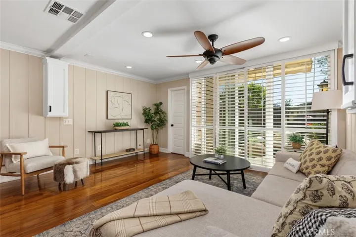 Living Room – Open living area with warm flooring, neutral paint, and a functional layout for everyday living or entertaining.

