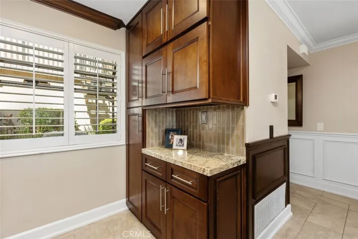 Kitchen Detail – Built-in cabinetry with floor to ceiling pantry and countertop space perfect for a coffee bar or recipe book