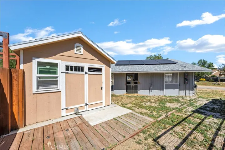 Outdoor shed with toliet, laundry hook ups and sink