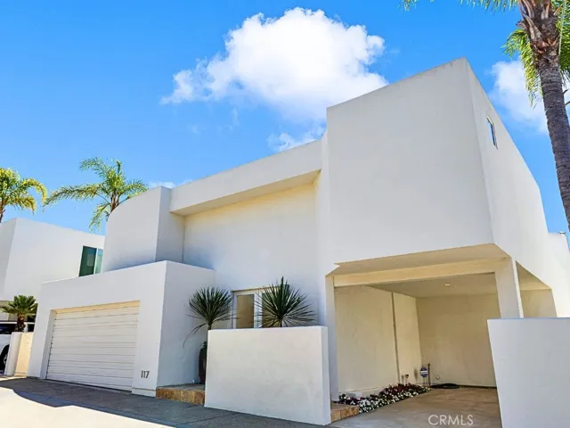 Rare Del Mar offering with a two-car garage, carport, and additional off-street parking.