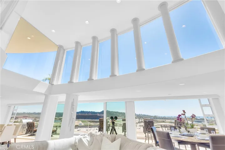 Volume, expansive glass, and natural light define the main living spaces.