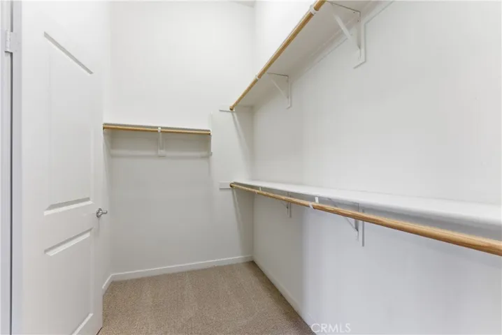 Extra tall and large master walk-in closet!