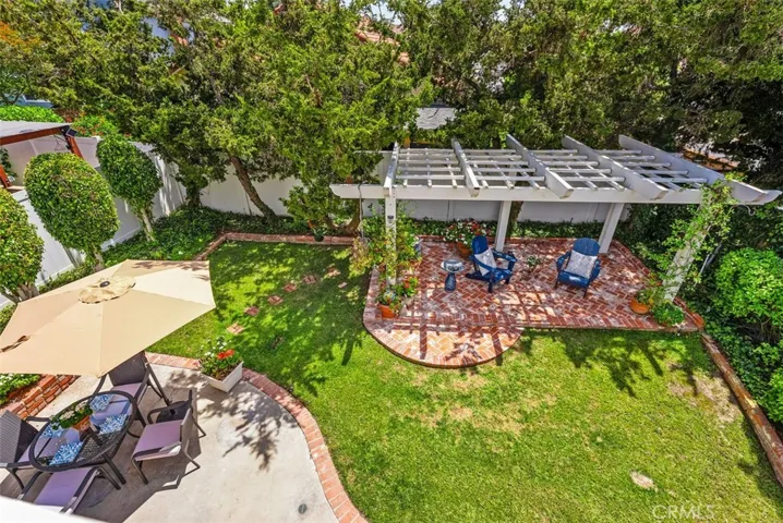 Pure magic! Dine alfresco under the picturesque arbor in your own, private sanctuary!
