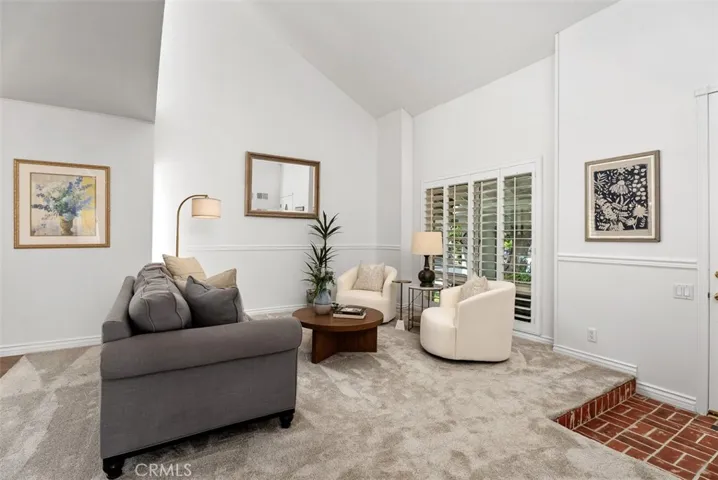 A warm welcome! This bright living space offers timeless charm and a wonderful open feel.