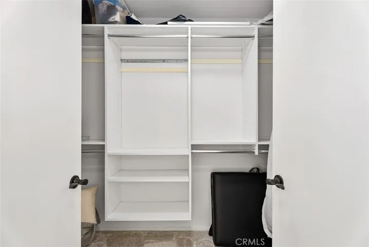 Dress in style. Enjoy the luxury of a generous walk-in closet complete with specialized shelving and hanging space.