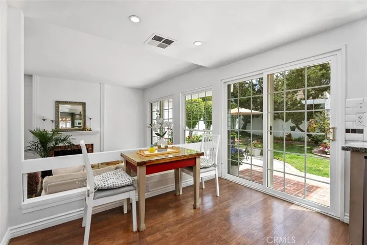 Sunlight and serenity! The dining area brings the beauty of the backyard right to your table!