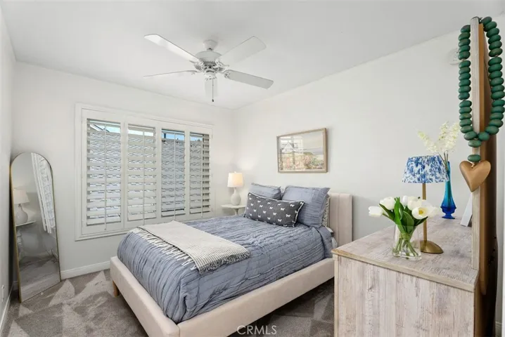 Light and bright! This spacious secondary bedroom features neutral tones and plenty of natural light, offering a comfortable space for everyone."