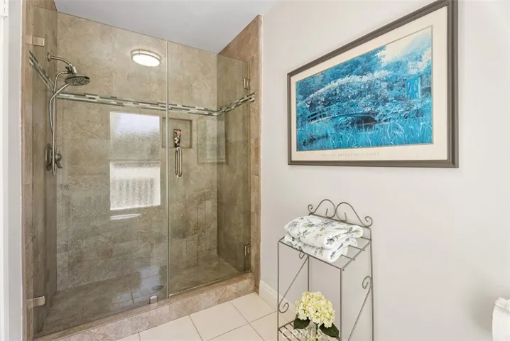 Refresh and renew! This beautifully updated, oversized shower offers a modern touch in the privacy of the primary suite.
