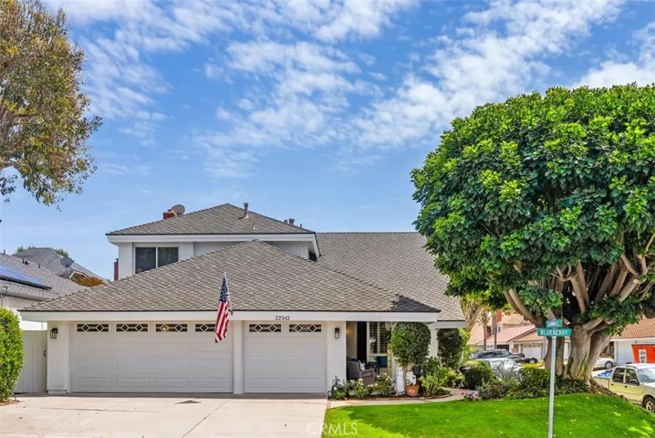 Curb appeal perfection! A beautifully refreshed sanctuary on a premier corner lot!