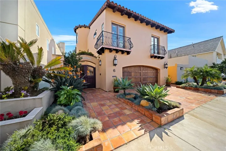 Entrance, 2 car garage, driveway.